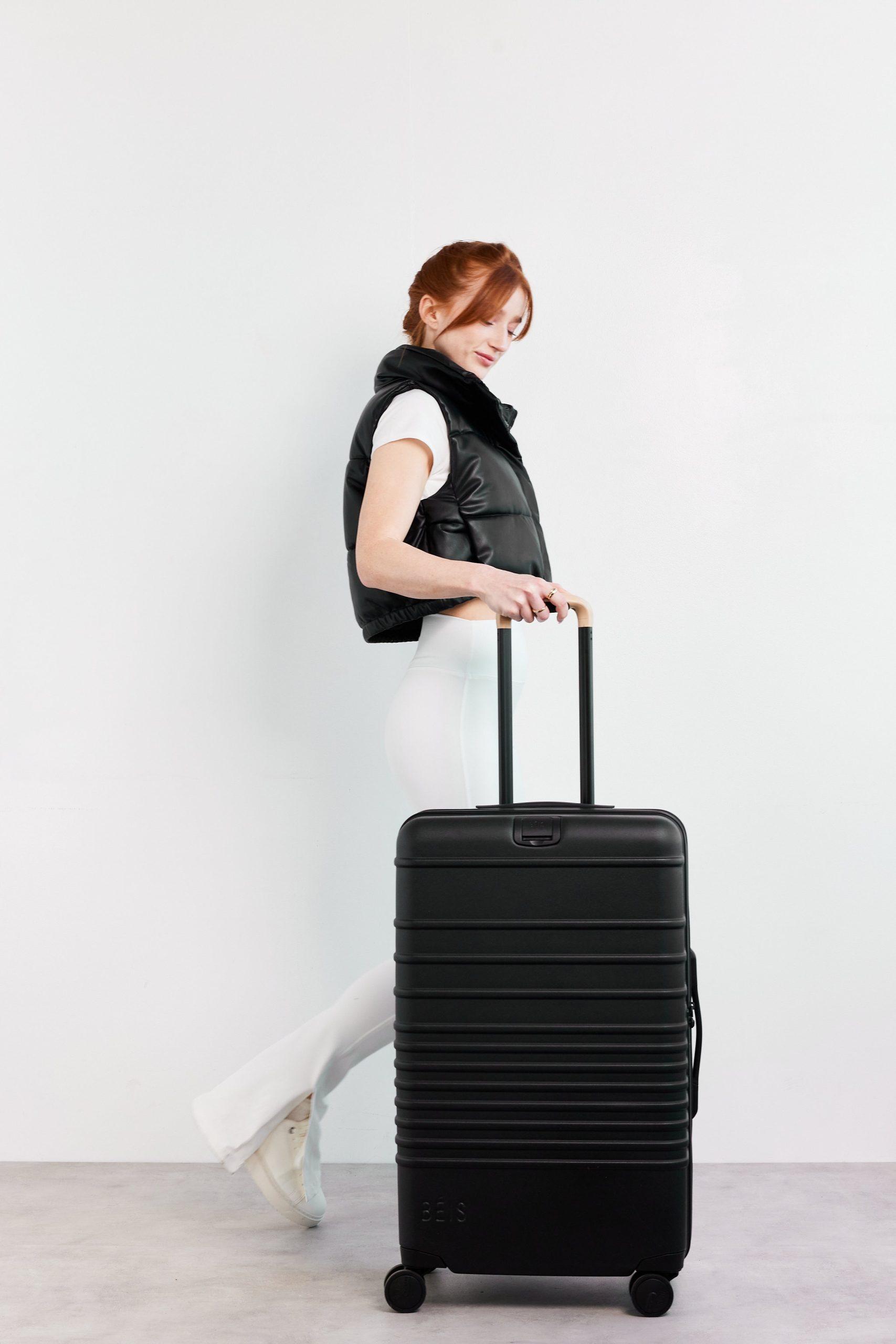 The Medium Check-In Roller in Black - Image 9
