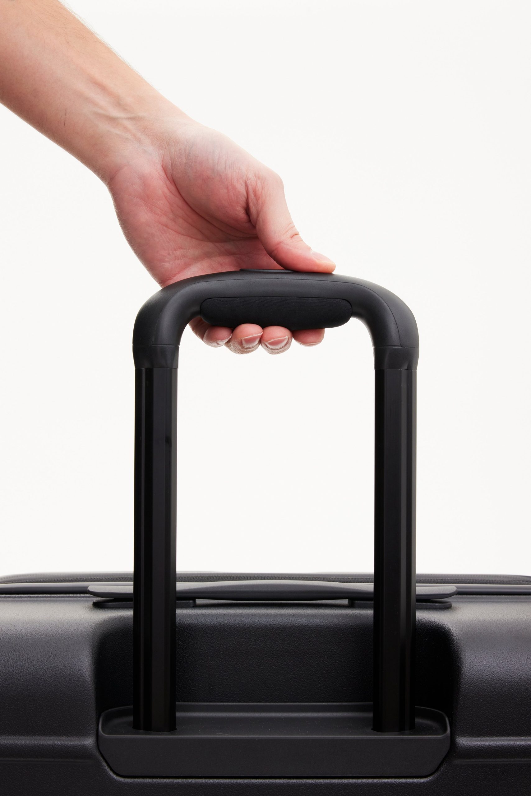 The Medium Check-In Roller in All Black - Image 7