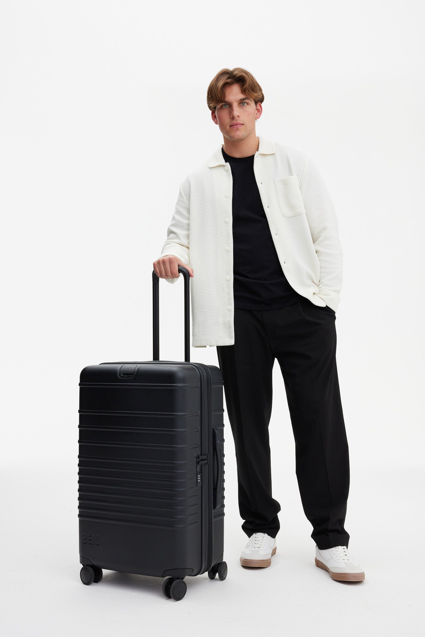 The Medium Check-In Roller in All Black - Image 5