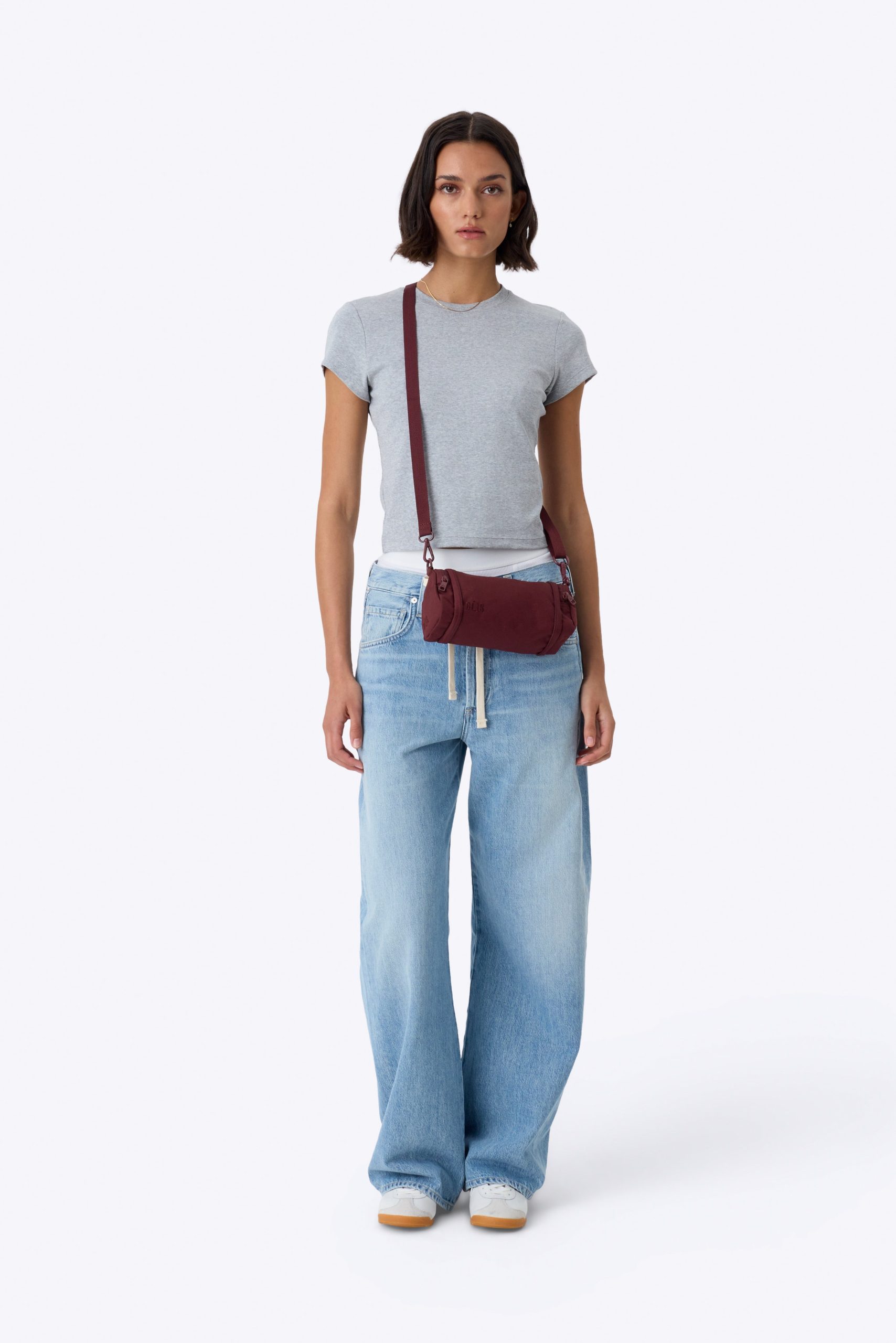 The Expandable Crossbody Charm in Burgundy - Image 2