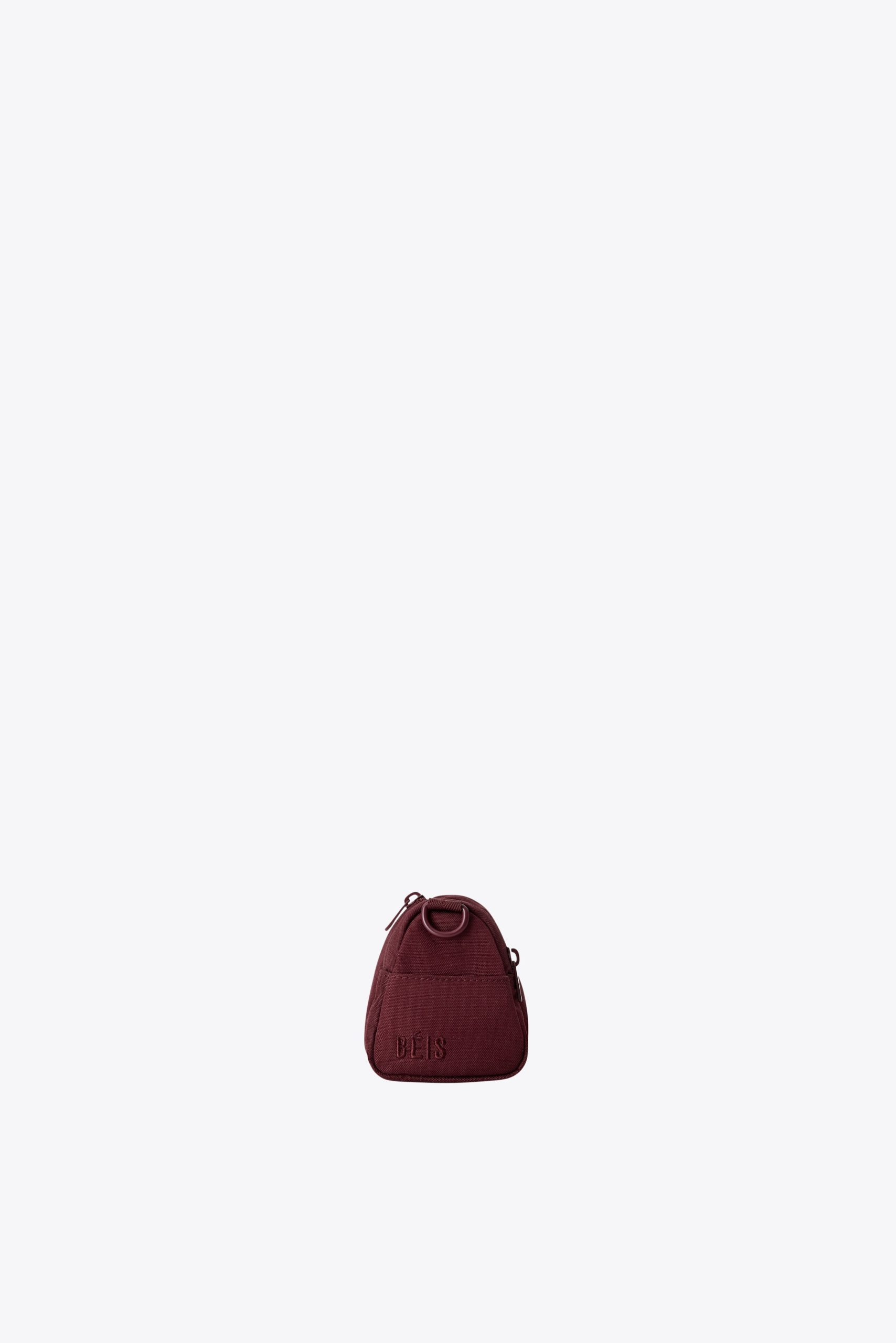 The Expandable Crossbody Charm in Burgundy - Image 7